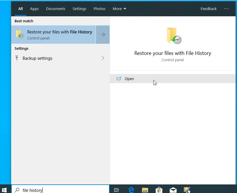 Press the Windows Key or type file history